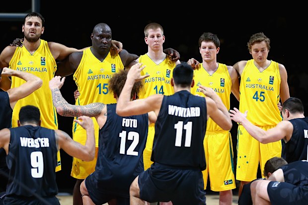 Boomers players look on as the Tall Blacks perform the Haka during the game one match between the Australian Boomers and New Zealand Tall Blacks at Rod Laver Arena on August 15, 2015 in Melbourne, Australia.