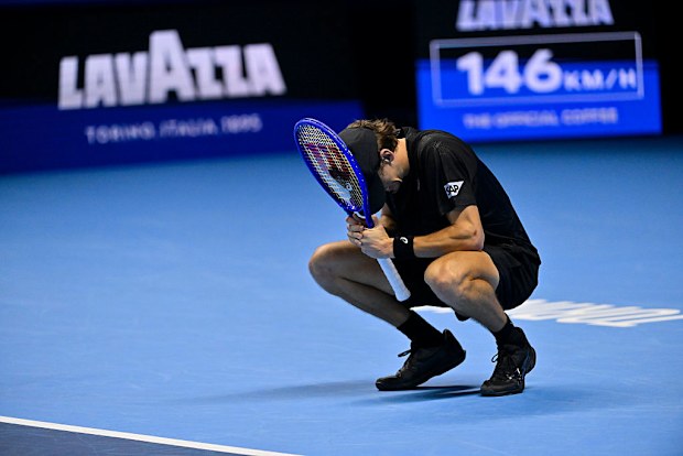 Jannik Sinner celebrates after defeating Alex de Minaur.