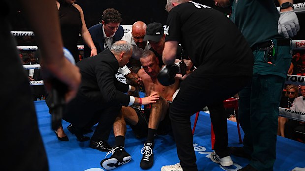 Huseyin Cinkara receives medical attention after being knocked out.