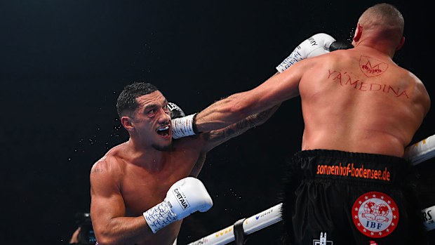 Jai Opetaia punches Huseyin Cinkara.