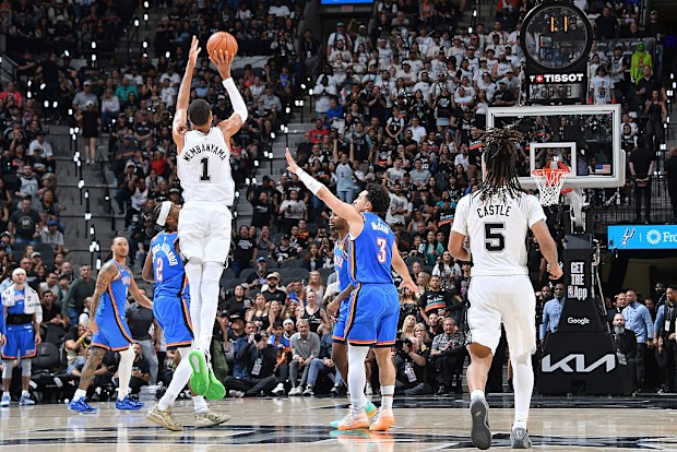 Victor Wembanyama of the San Antonio Spurs hits a buzzer beater three point shot.
