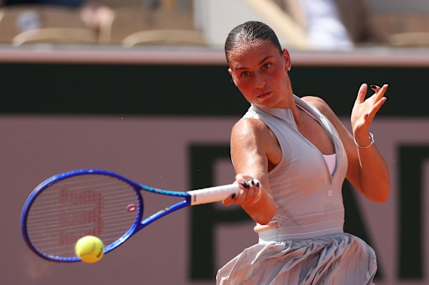 Marta Kostyuk of Ukraine plays a forehand.