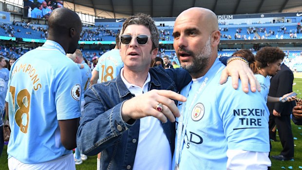 Noel Gallagher speaks to Pep Guardiola.