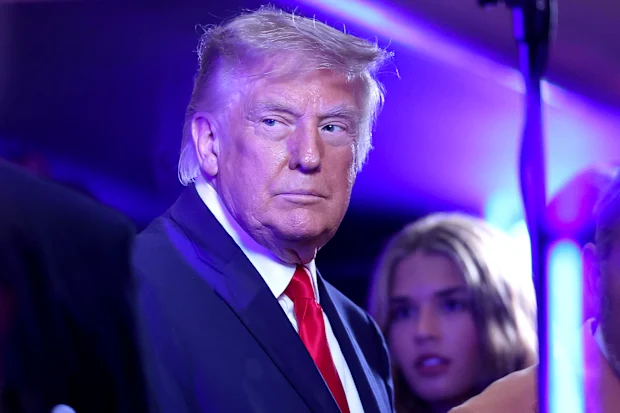 Donald Trump looks on during game three.