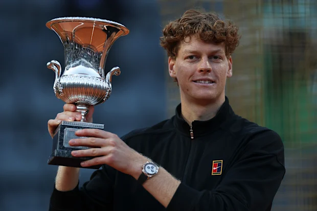Jannik Sinner poses with the trophy at the awarding ceremony for the men's singles final between Jannik Sinner of Italy and Casper Ruud of Norway at the ATP Italian Open in Rome, Italy, May 17, 2026. (Photo by Li Jing/Xinhua via Getty Images)