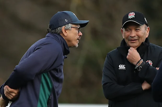 England coach Eddie Jones talks to London Irish coach Les Kiss in 2019.