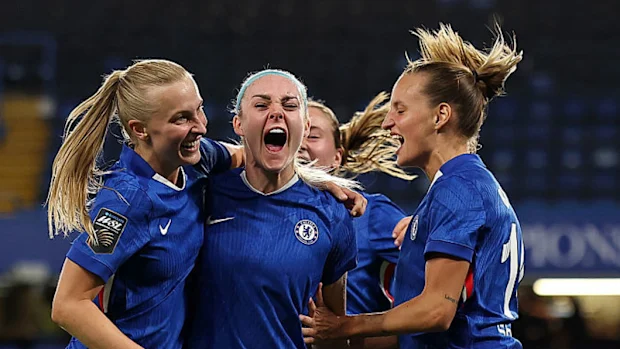 Aggie Beever-Jones of Chelsea celebrates with teammates Ellie Carpenter and Nathalie Bjoern.
