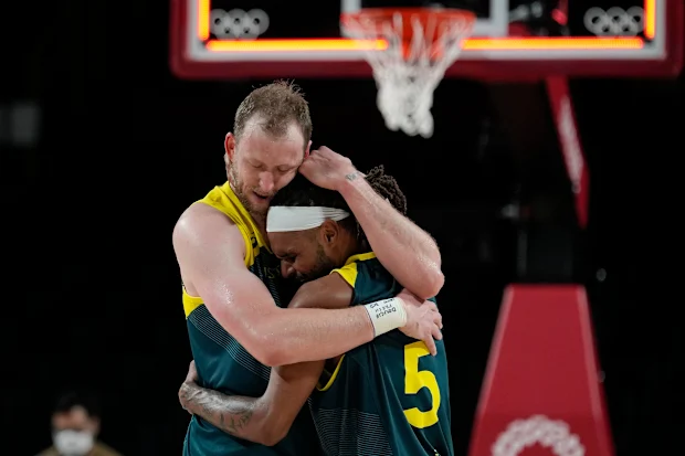 Joe Ingles and Patty Mills after winning the men's basketball bronze medal game